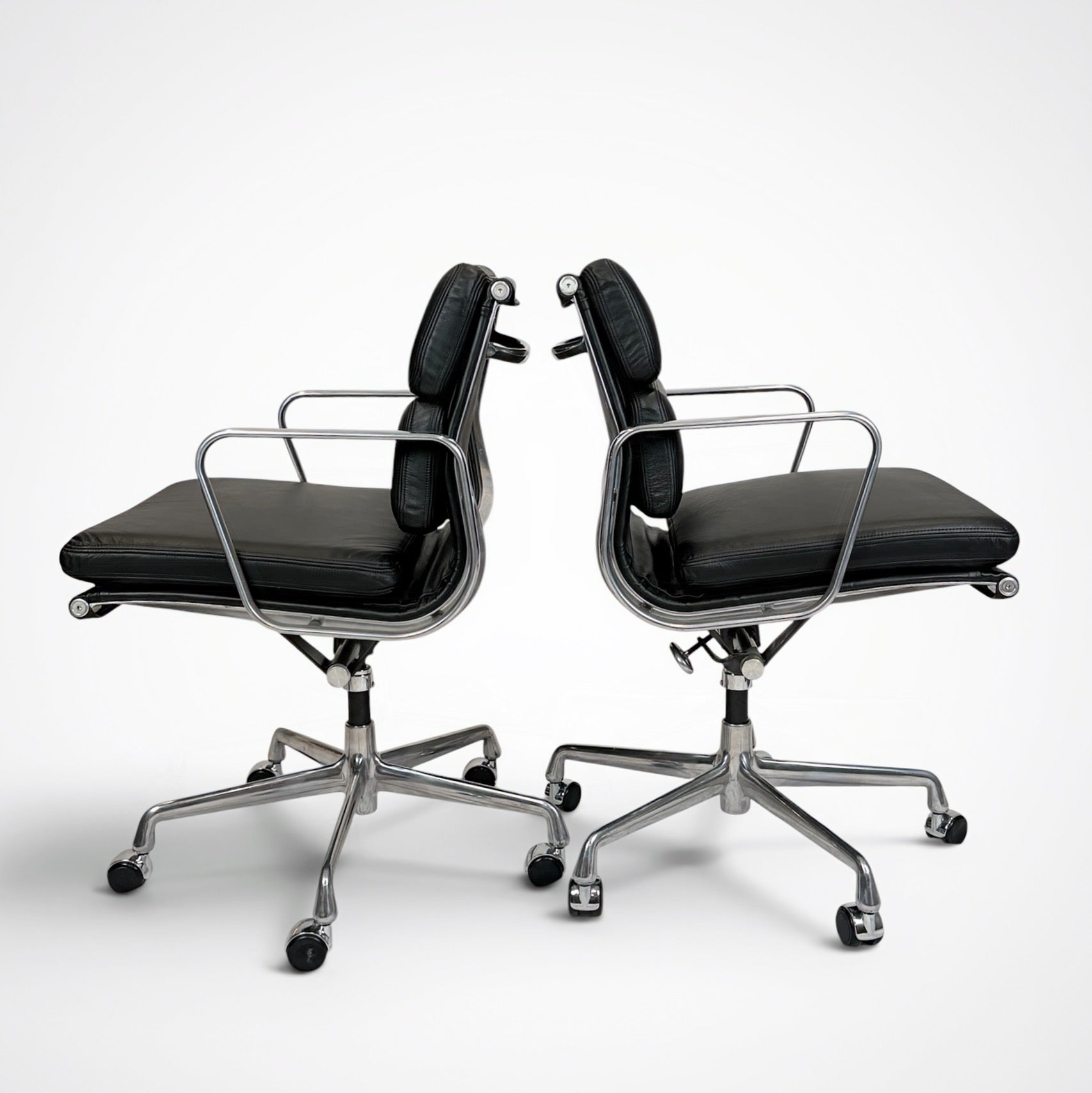 Pair of Eames Aluminum Group Soft Pad Management Chairs by Herman Miller Black Leather