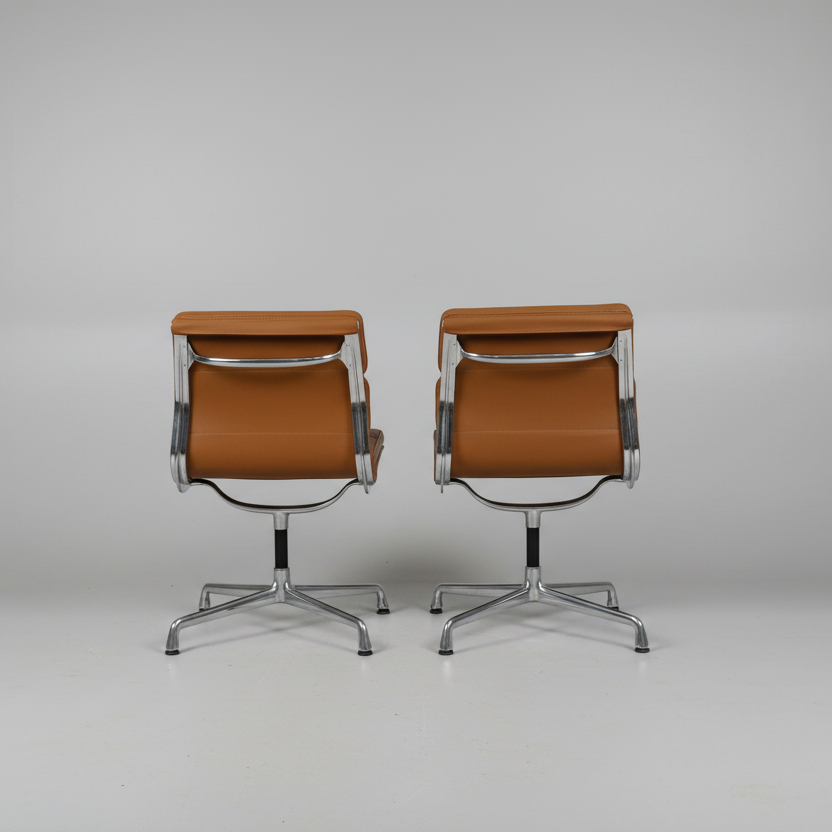 Pair Of Eames Aluminum Group Side Chairs