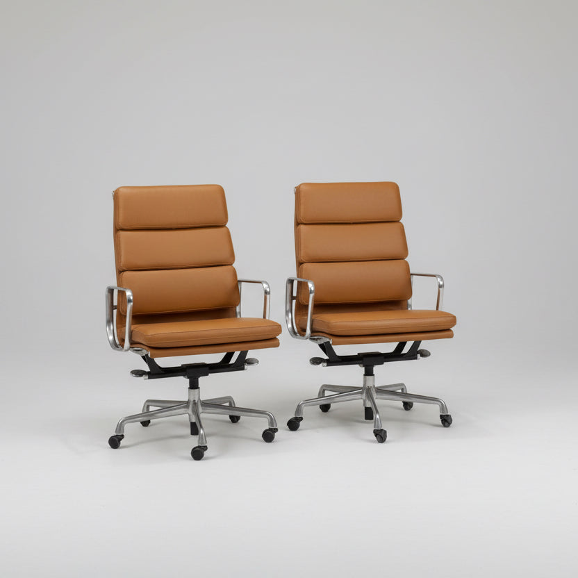 A Pair of  Eames Aluminum Group Executive Chairs