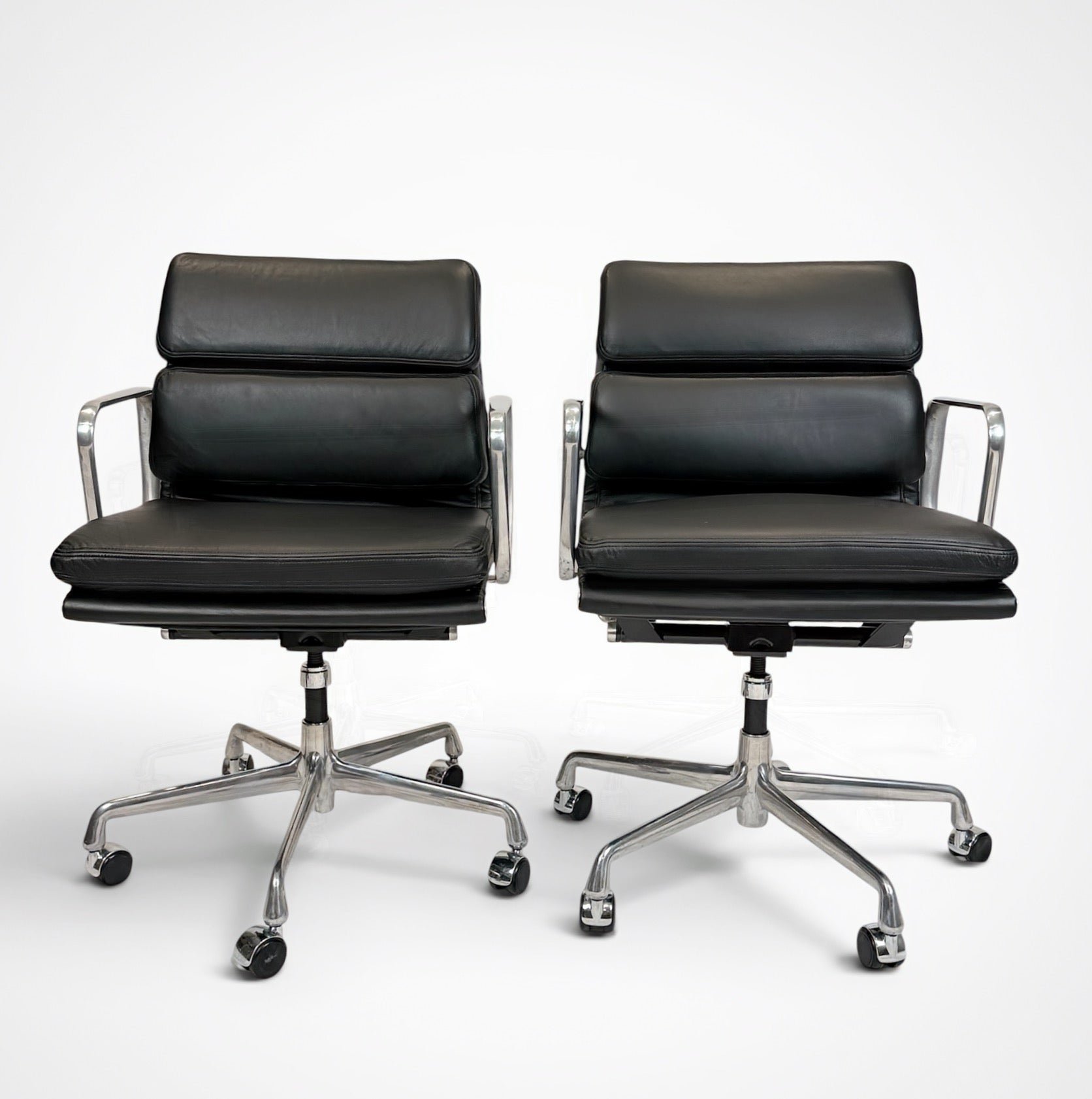 Pair of Eames Aluminum Group Soft Pad Management Chairs by Herman Miller Black Leather