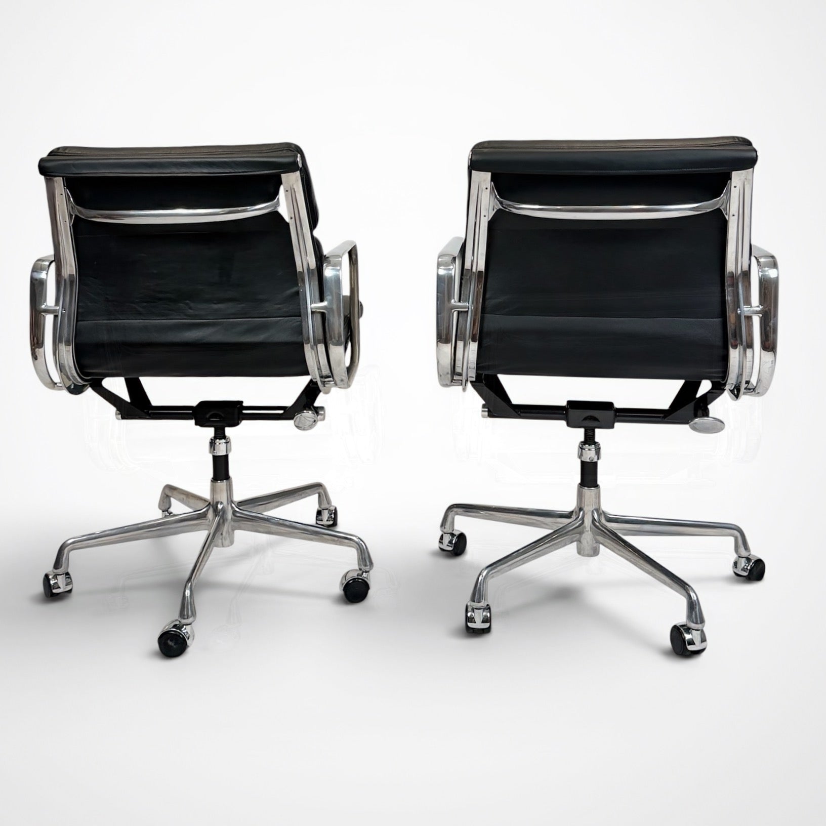 Pair of Eames Aluminum Group Soft Pad Management Chairs by Herman Miller Black Leather